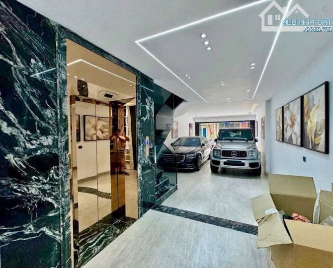 Giảm sâu 4 tỷ - Phường Việt Hưng 6 tầng thang máy 2 Oto tránh Dt 110m2 mt 5.2m
